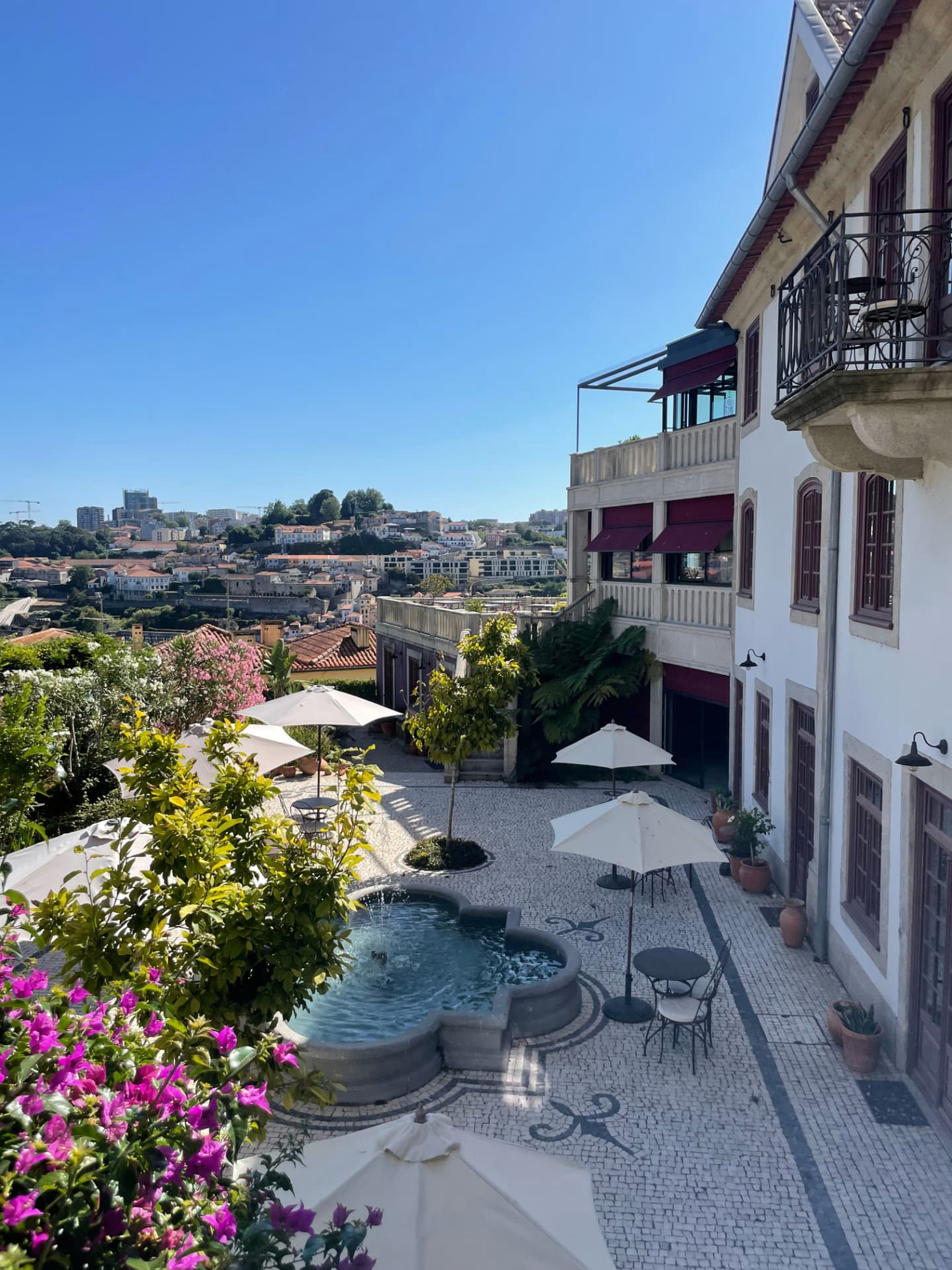 Terrace, fountain and Douro views at Casa Camélia in Porto